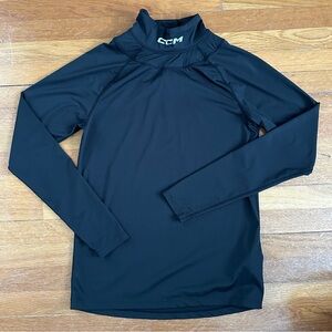 CCM Black compression long sleeve Hockey Shirt with attached neck protector.